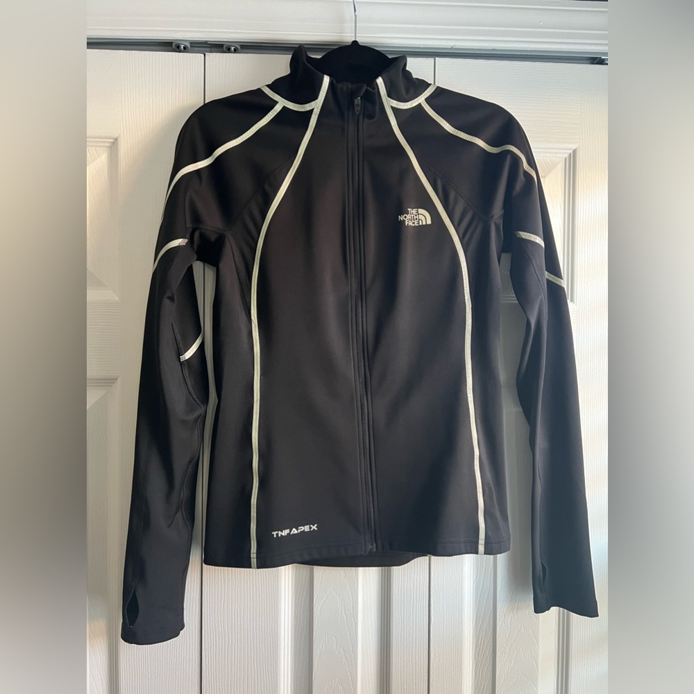 The North Face women’s running jacket, size small.